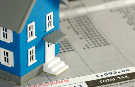 How can a homestead exemption lower property taxes?