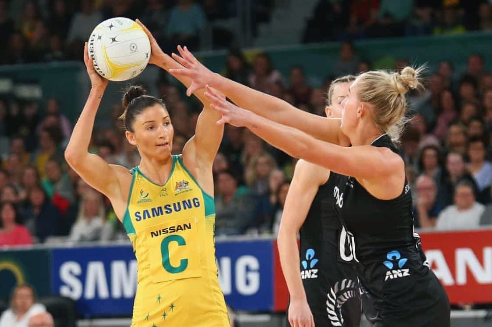 Kim Ravaillion looks to pass the ball against the New Zealand Silver Ferns. Image: Getty