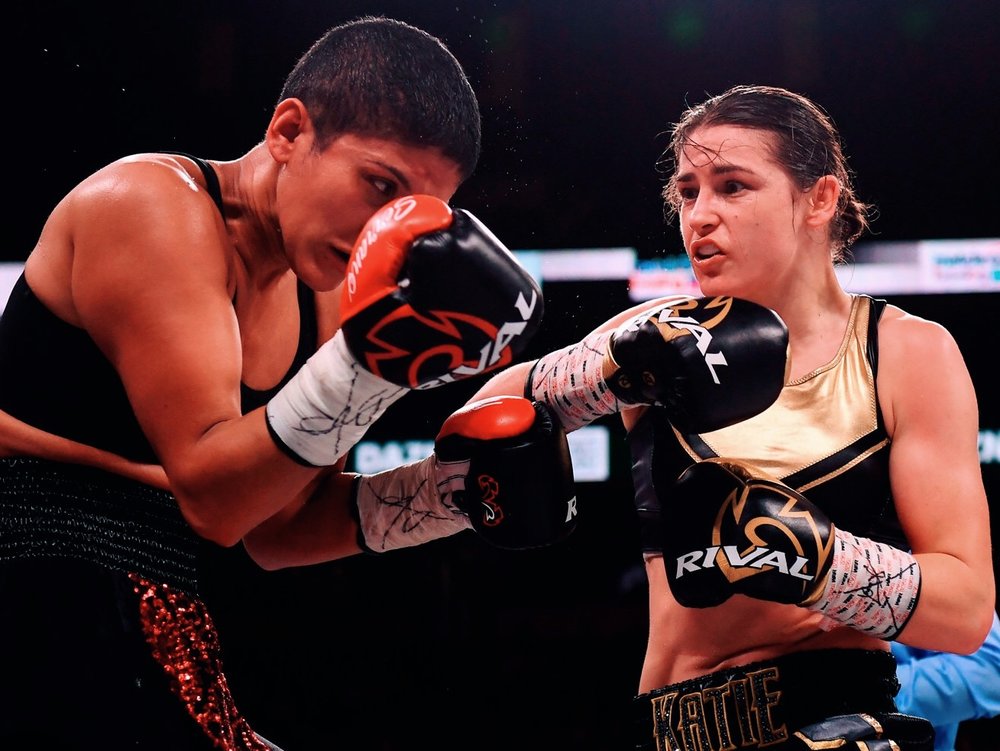 Katie Taylor, right, and Cindy Serrano during their WBA &amp; IBF Female Lightweight World title bout at TD Garden in Boston, Massachusetts, USA. Photo by Stephen McCarthy/Sportsfile