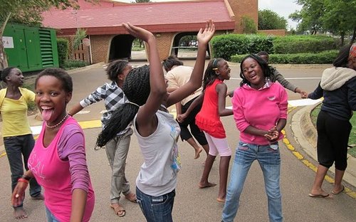 Pat McLeod Co-Author of Hit Hard: Mamelodi Initiative students playing outside