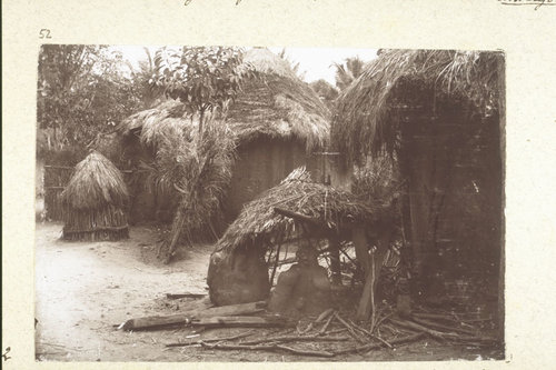A fetish for protection (a mud statue) at the entrance to a village in Togo, circa 1900.