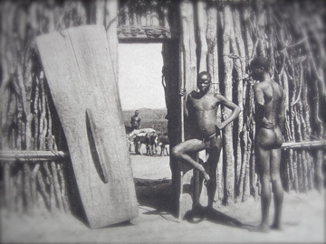 Boma man and his front door, among the Legbaru, Belgian Congo, 1930.