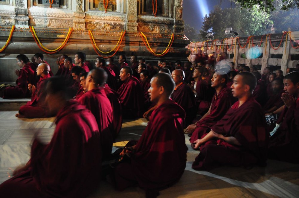 Tibetan monks chanting at the Bodhi Tree, Bodhgaya.JPG