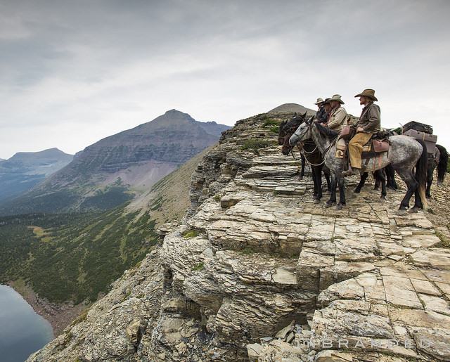 Ben Masters (on the gray horse) riding the trail for the film, book and multi-content feature Unbranded. 
