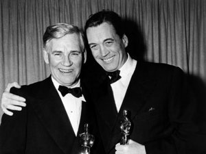 John Huston (right) with his father, Walter Huston taking Oscars for their work in The Treasure of the Sierra Madre (1948).  John for Best Director and Best Writing Adapted Screenplay, and Walter for Best Supporting Actor.