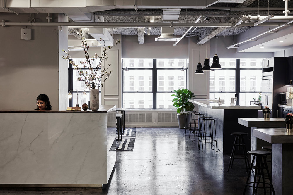 reception area of modern industrial coworking space