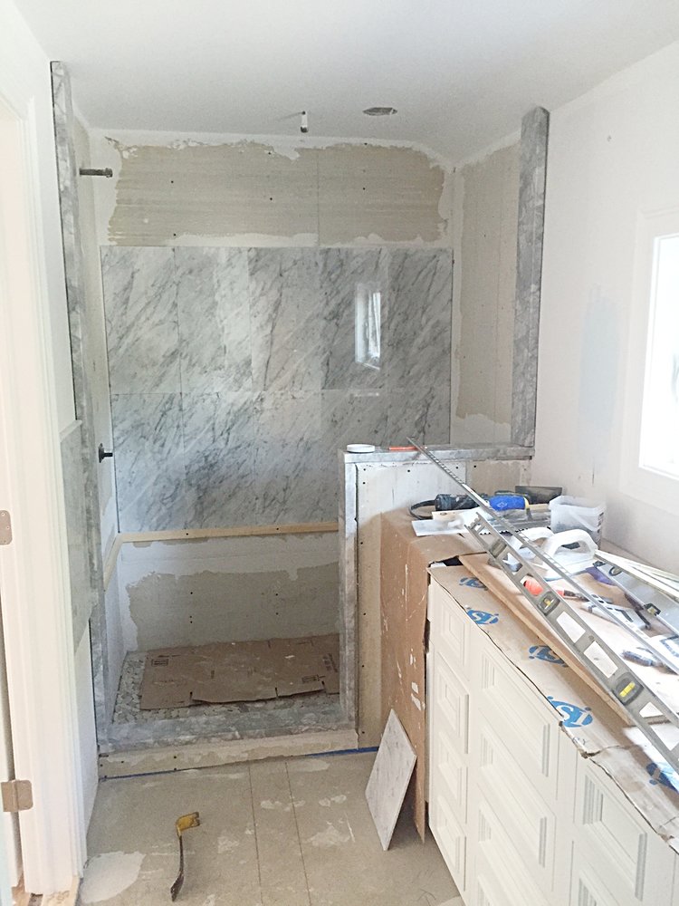 Cabinets are in, marble being placed 