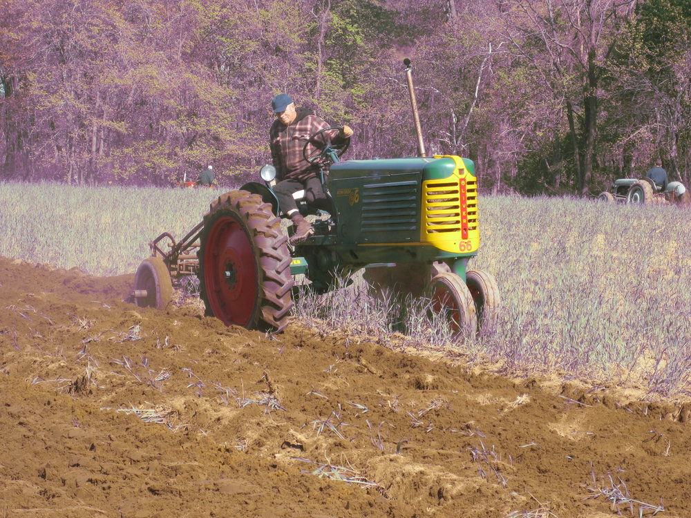 ford tractors plowing