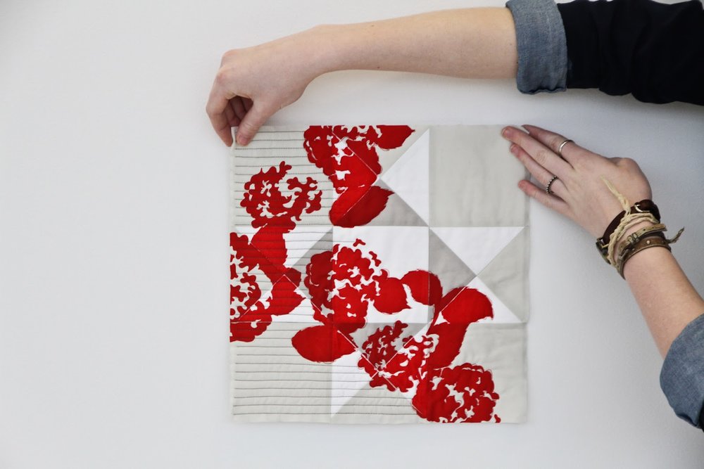 hand-printed modern quilt in red on low volume Ohio Star | by Lovely and Enough