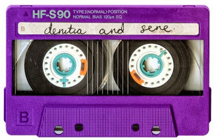 purple vintage cassette tape with clear front and handwriting