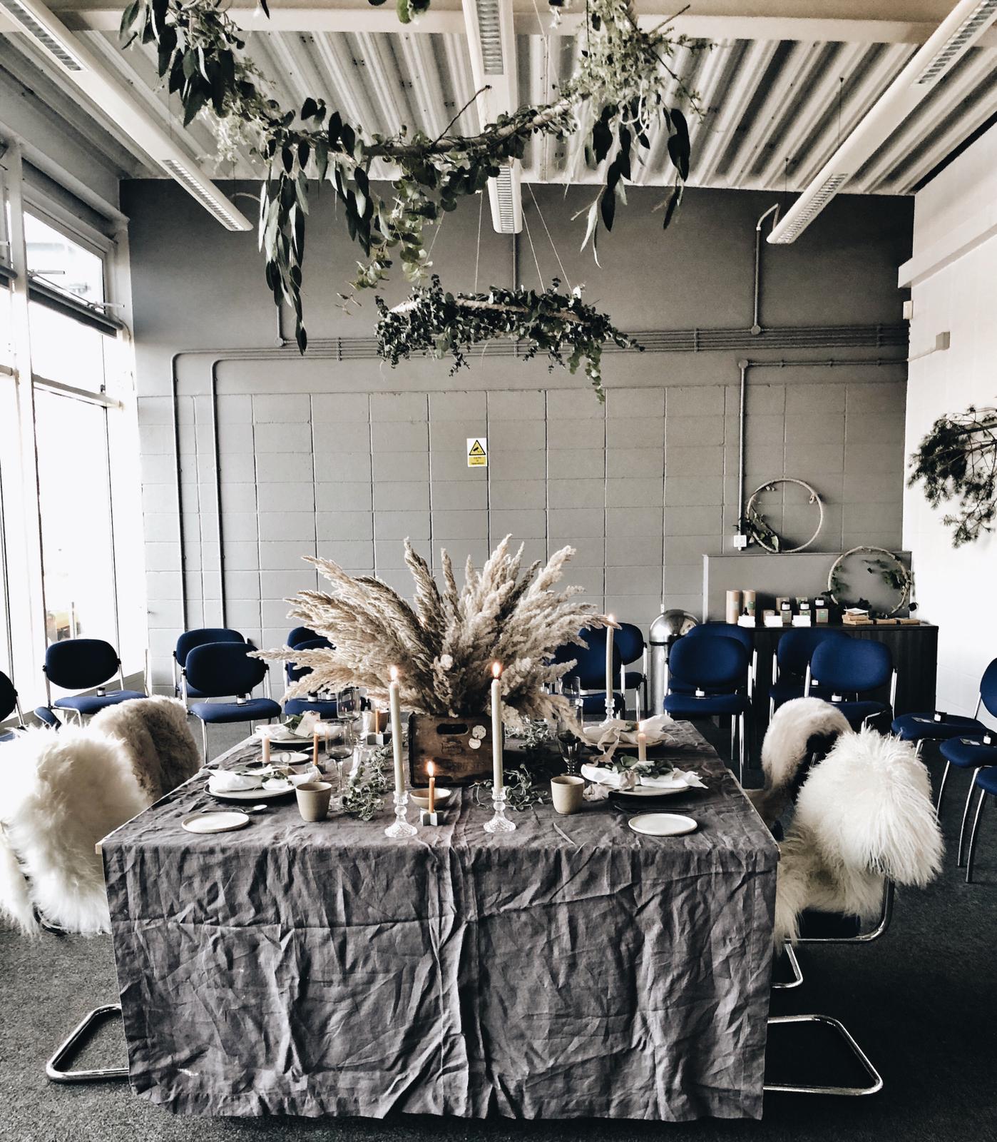  We were working with quite a big space so went for a dramatic table centre piece using pampas grass and made the table cosier by adding sheepskins to our chairs from Jord Home 