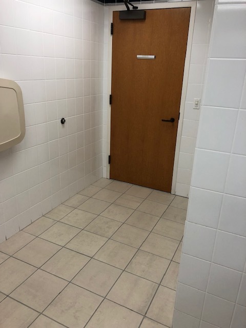 This just kills me - a door you have to open from the inside with a handle and no trash can by the door for a paper towel….