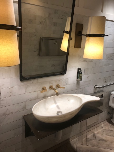 Love these faucets (if anyone knows the designer please let me know, I want for our remodel!)- but so much to touch in this pretty bathroom
