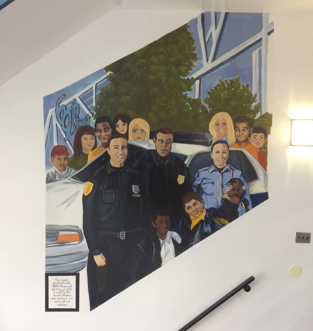 Mural of officers and youth painted by young residents of Upper Darby (photo by Mitchell Bloom)