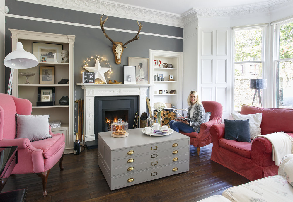    The chimney wall is painted in ‘Downpipe’ by Farrow & Ball   