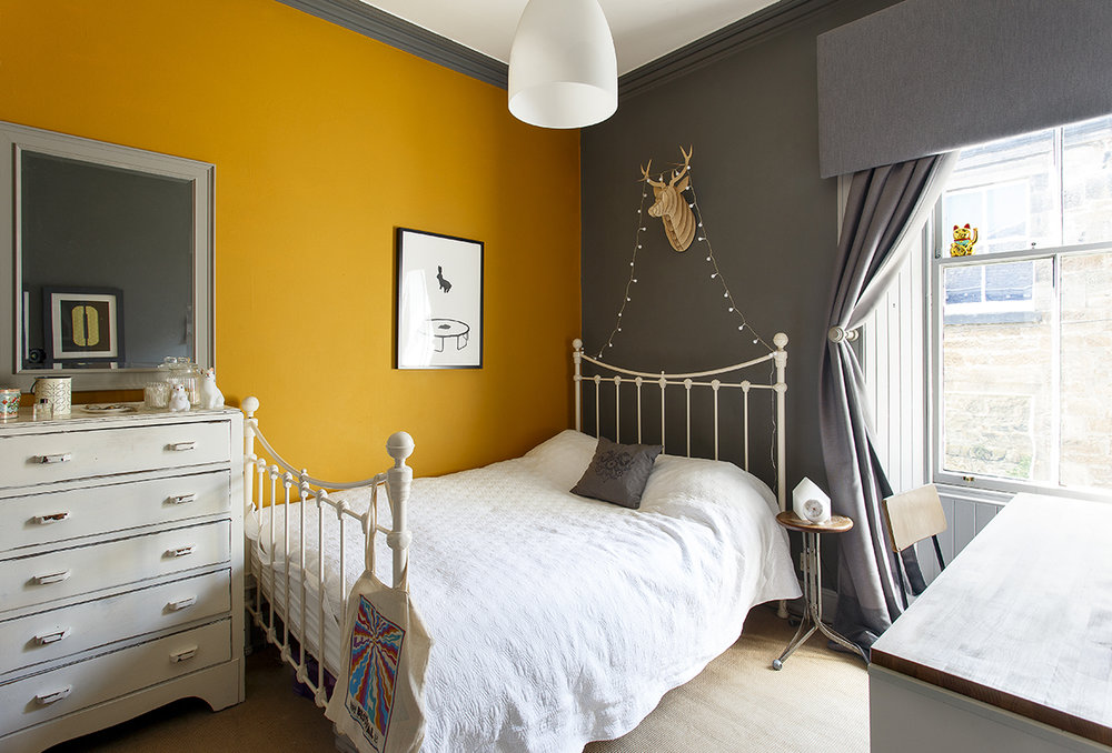    The orange wall is painted in Mustard by Dulux.   