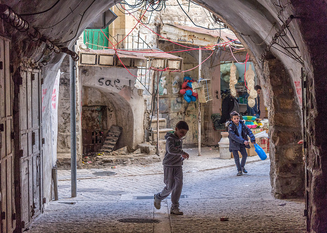 Children play in Hebron. One of the most volatile places in the Westbank, Hebron is patrolled by IDF soldiers protecting the roughly 400 Israeli settlers living in the middle of the Palestinian old city. Photo by: Ronan Shenhav