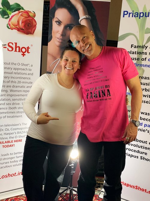 CNP Provider Kyla Westrick with Dr.Charles Runels in one of our awesome t shirts!