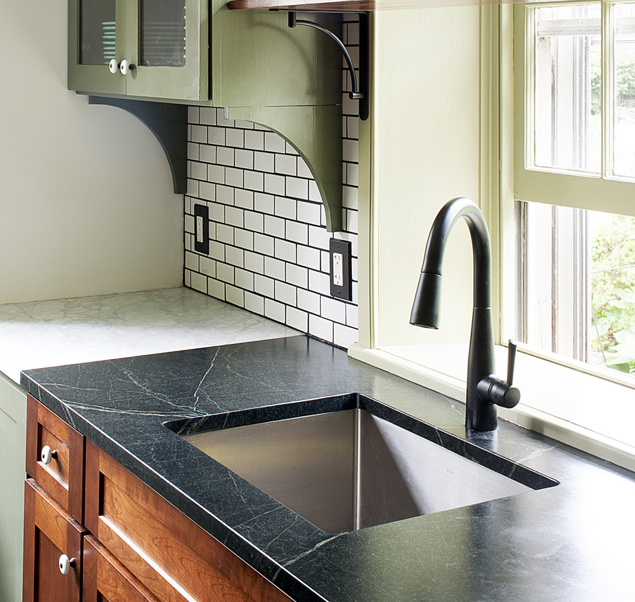 This soapstone has distinctive veining with a hint of green.
