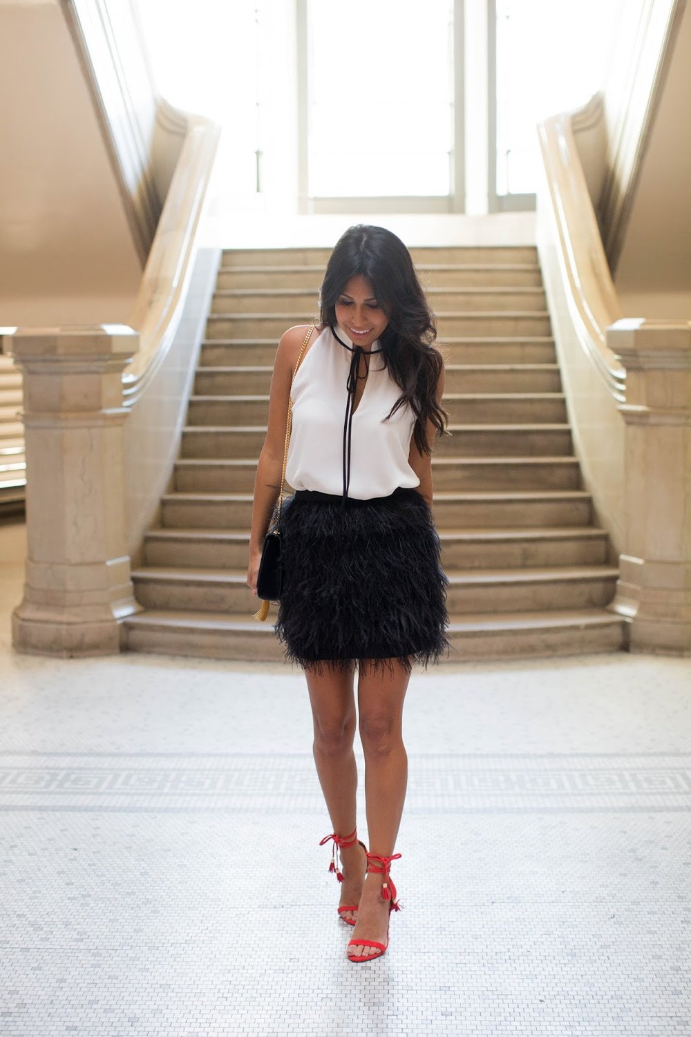 how to style feather skirt, holiday outfit ideas, red heels