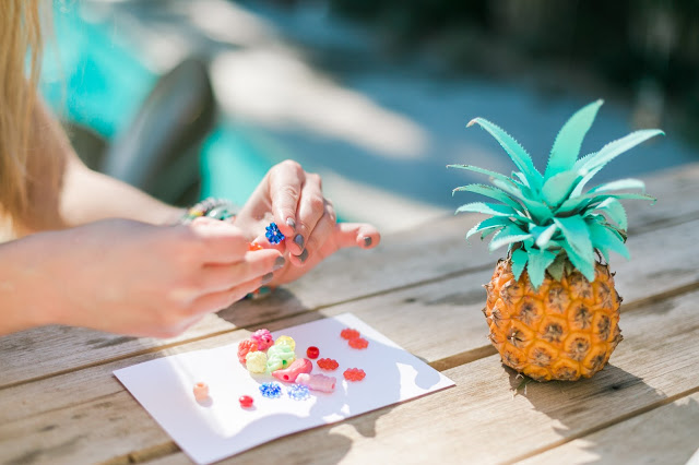 painted pineapples, mini pineapples, pool party ideas