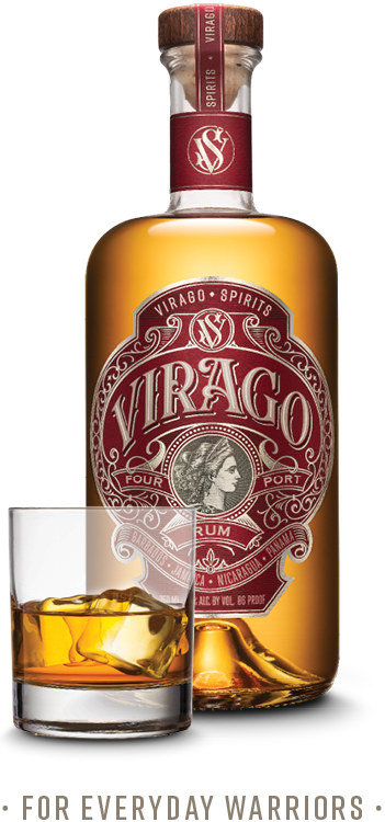 A glass with dark liquid and ice cubes in front of a bottle of Virago's Four Port Rum