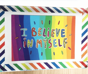 A page of Cara's art journaling, which reads 'I believe in myself'