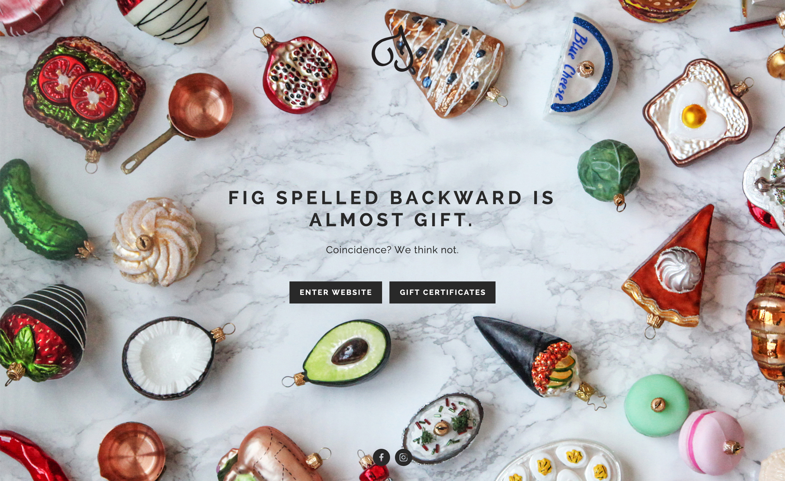 An image of the alternative holiday homepage for The Fig Cooking SChool. Food ornaments are scattered on a marble backdrop with a headline that says 'FIg Spelled Backward is almost Gift. Coincidence? We think not.' with links to enter the website or buy a gift certificate.