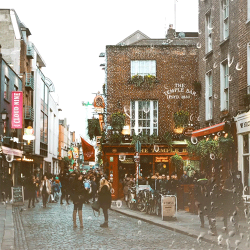 A GIF of Temple Bar in Dublin, Ireland with rain dripping down the front in a constant loop.