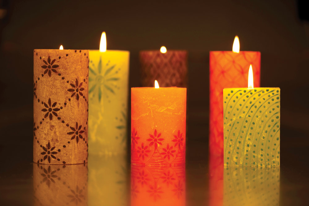 kapula-hand-painted-pillar-candles-lit-flame-glowing