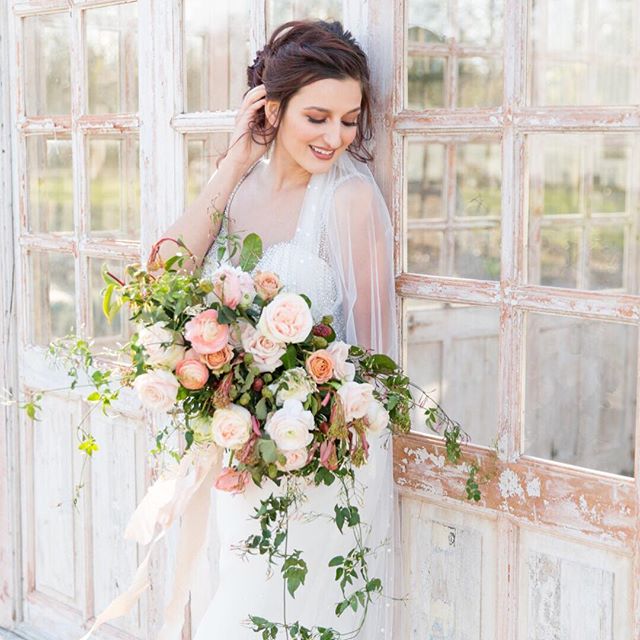 That “it’s my wedding day” giggle is just the sweetest! .
Host: @styledshootsacrossamerica
Planning & Design: @heatherbengeevents
Venue: @thewhitesparrow
Hair & Makeup: @sunkissedandmadeup
Gowns: @impressionbridalstore
Florals: @detailsdallasflorals @intrigue_designs @flowershackblooms @southerncharmcolorado
Shoes: @davidtuterafootwear 
Veils:  @kathrynannbridal