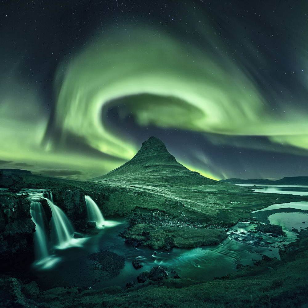 kirkjufell aurora borealis northern lights iceland waterfall night composite.jpg