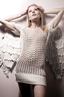 Woman posed with angel wings