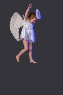 Little girl in angel costume