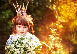 Little girl with crown on her head