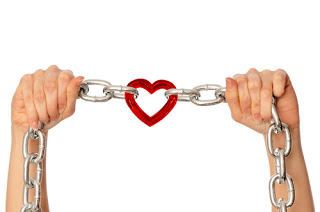 Heart connected by two chains