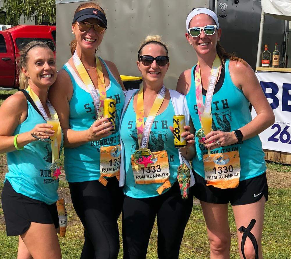 Jamie Dowd, Carrie Browne, Jamie Taylor and Beth Mourelatos with 26.2 Brew after running in the Marathon of the Treasure Coast in Stuart, Fl., photo courtesy Jamie Taylor