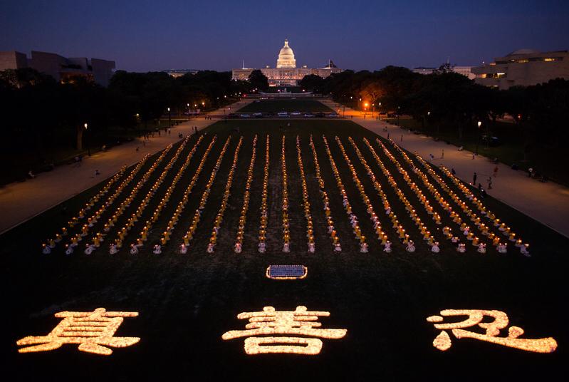 Washington DC, July 2014; Candle Light Vigil commemorating 15 years of persecution (photo by James Howard Smith)