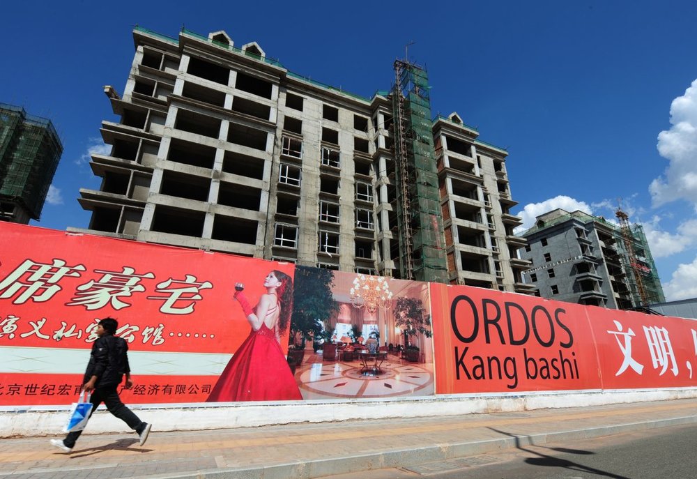 Empty apartment buildings stand in the city of Ordos, Inner Mongolia on Sept. 12, 2011. (MARK RALSTON/AFP/Getty Images)
