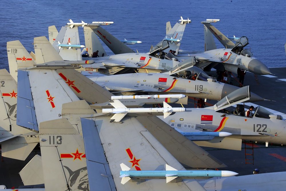 J15 fighter jets on China’s sole operational aircraft carrier, the Liaoning, during a drill at sea in April 2018. (-/AFP/Getty Images)