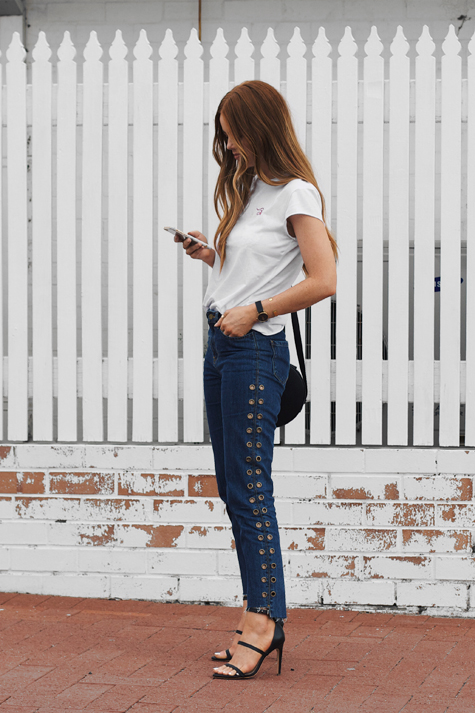 NA-KD t-shirt, relaxed blue denim jeans, eyelet trend, raw hemline, the mode collective sara heel