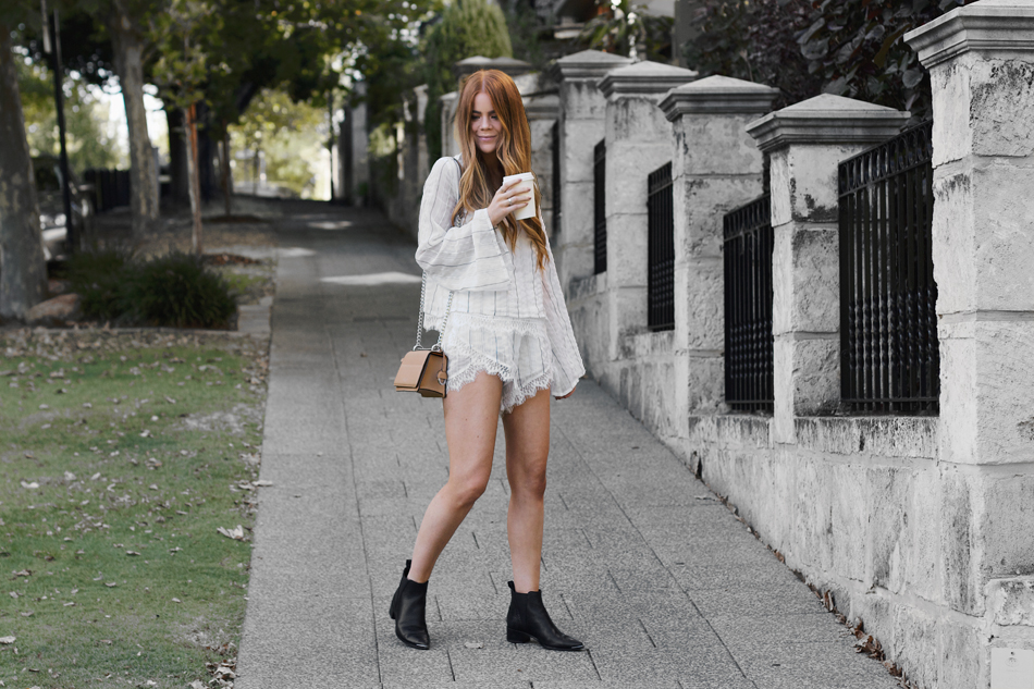Elliatt top and shorts, Oroton Forte clutch, flared sleeves, Acne Jensen boots