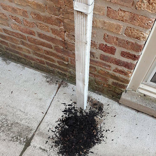 Chicago-Gutter-Cleaning-Downspout-Debris.jpg