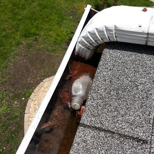 Gutter Cleaning Chicago_Clogged Downspout_Guaranteed Gutters.jpg