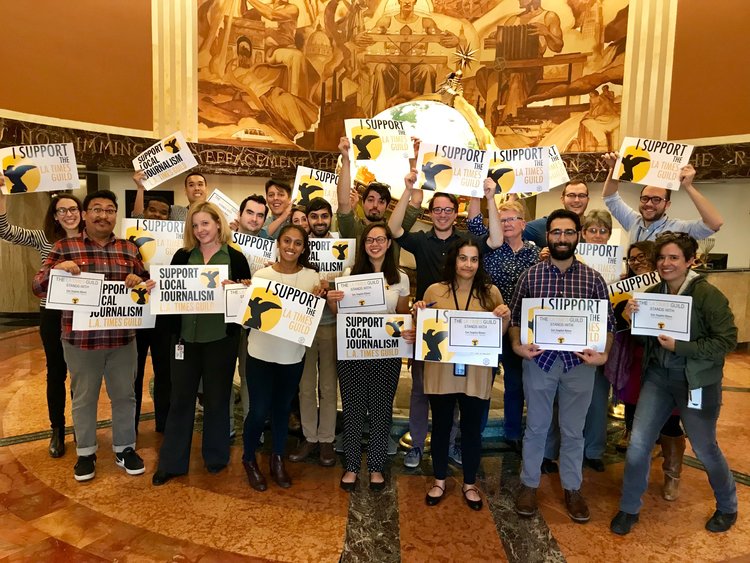 Members of the L.A. Times Guild organizing committee show their support for Times Community News.