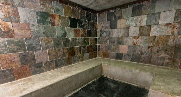 Sauna Room with Stone Benches and Stone Tiled walls