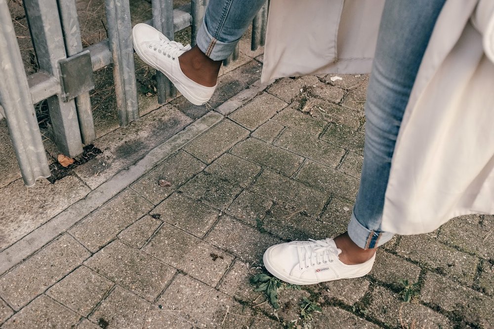 Fashion blogger wearing Classic 2750 superga trainers in all white