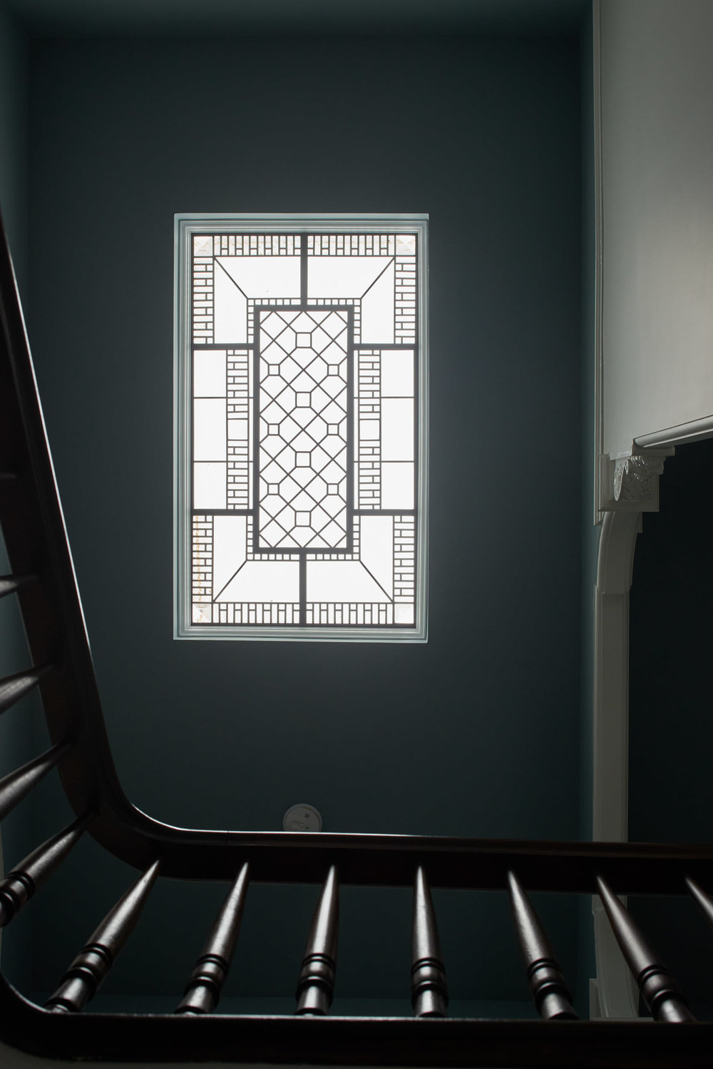 Stained and leaded glass rectangular skylight ceiling with clear jewels and custom bevelled glass for a restored historical house in San Francisco.  