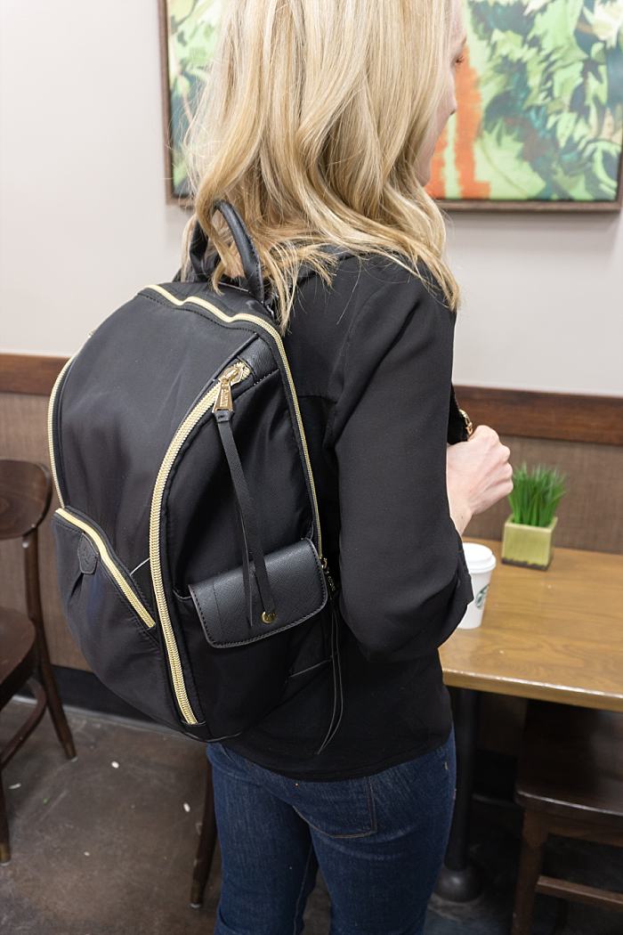 Image of customer using a bulletproof backpack with a ballistic insert.