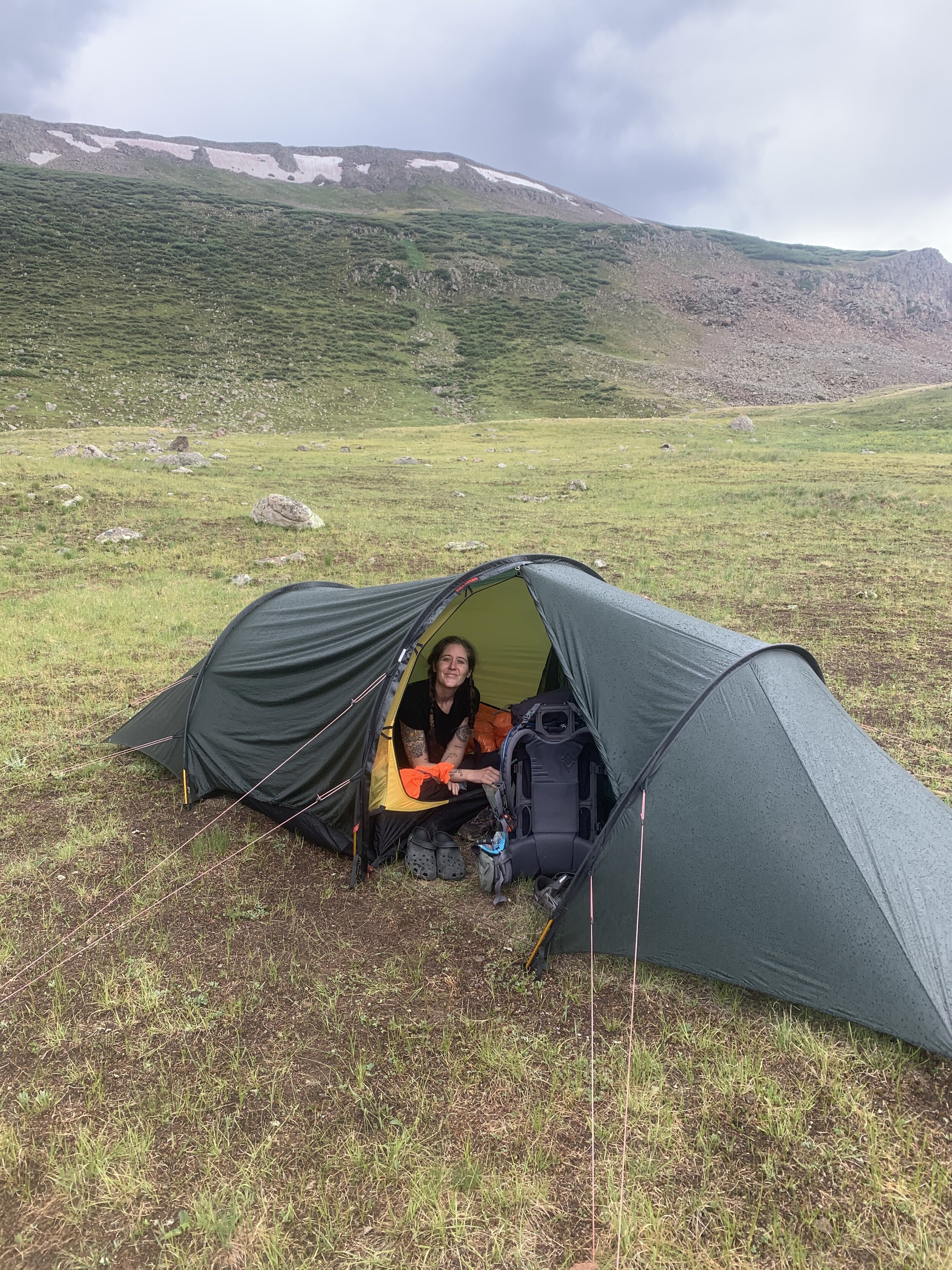 Team Cold Case testing out the West Slope Case while staying dry in the tent. It's an essential item for your backcountry hunting gear list.